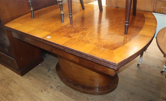 An Art Deco birds eye maple extending dining table 138cm